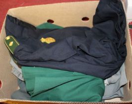 A Bavarian Police tunic, in green cloth, with four front fastening pockets, and badge to the left