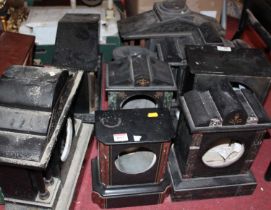 A collection of slate mantel clock cases only, to include some of architectural outline (8)