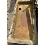 A large shallow butler's stone trough sink, 122 x 59cm