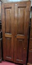 A 19th century mahogany twin recessed panelled twin door hall cupboard, width 73cm