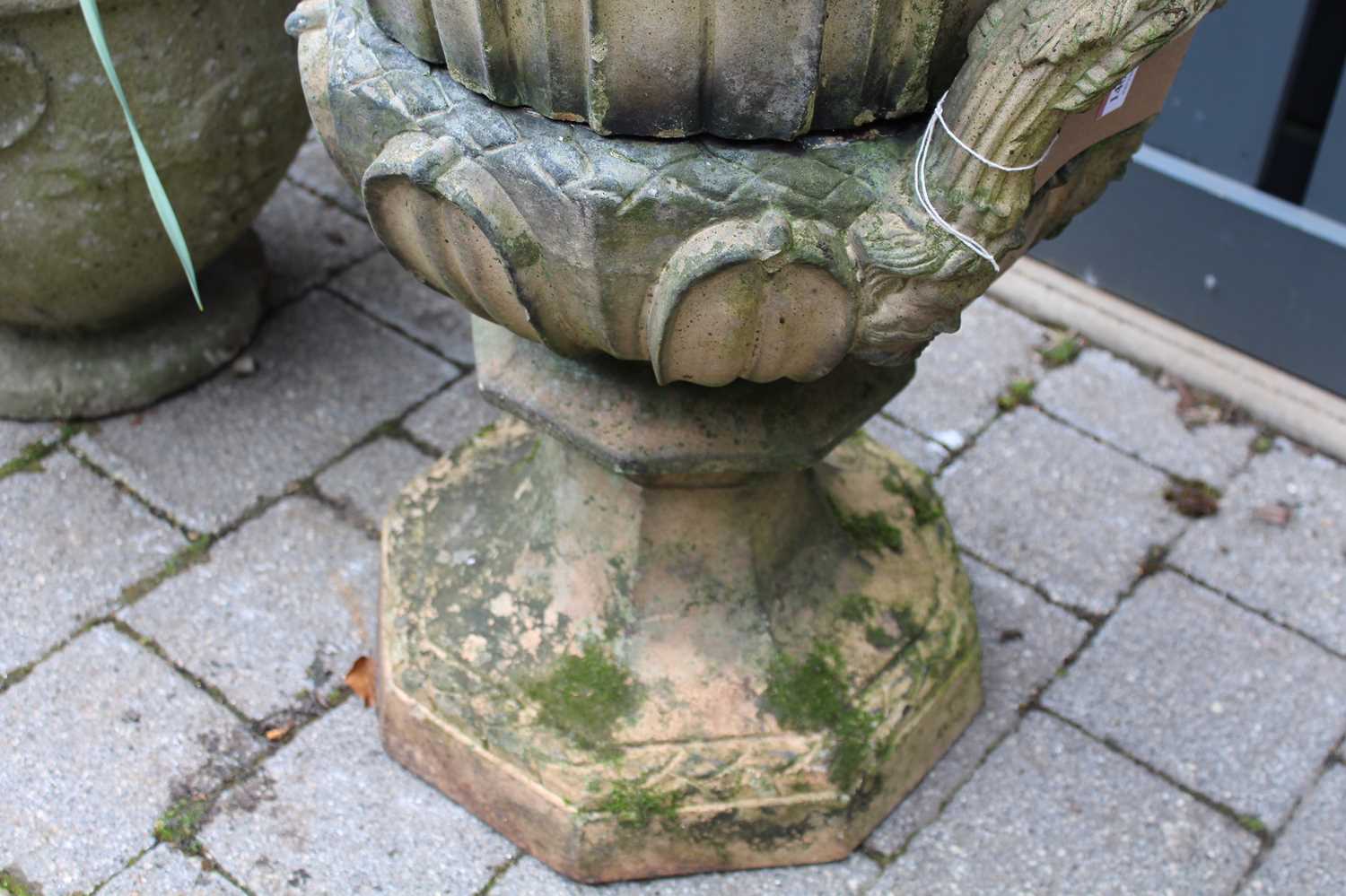 A terracotta twin handled pedestal garden urn, having octagonal top with repeating leaf design, - Image 3 of 4