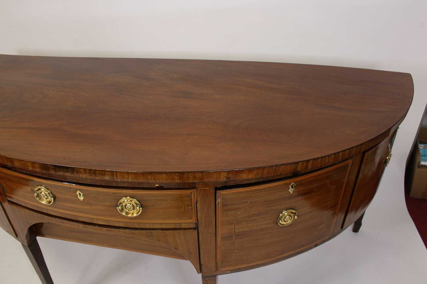 A George III mahogany and inlaid demi-lune sideboard, of large proportions, having a centre frieze - Image 2 of 4