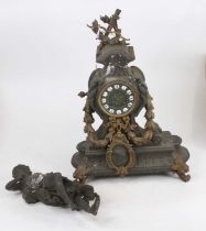 A late 19th century spelter and gilt metal mantel clock, h.48cm; together with a probably associated