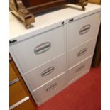 A pair of Silverline metal three drawer office filing cabinets, w.46cm; together with a teak