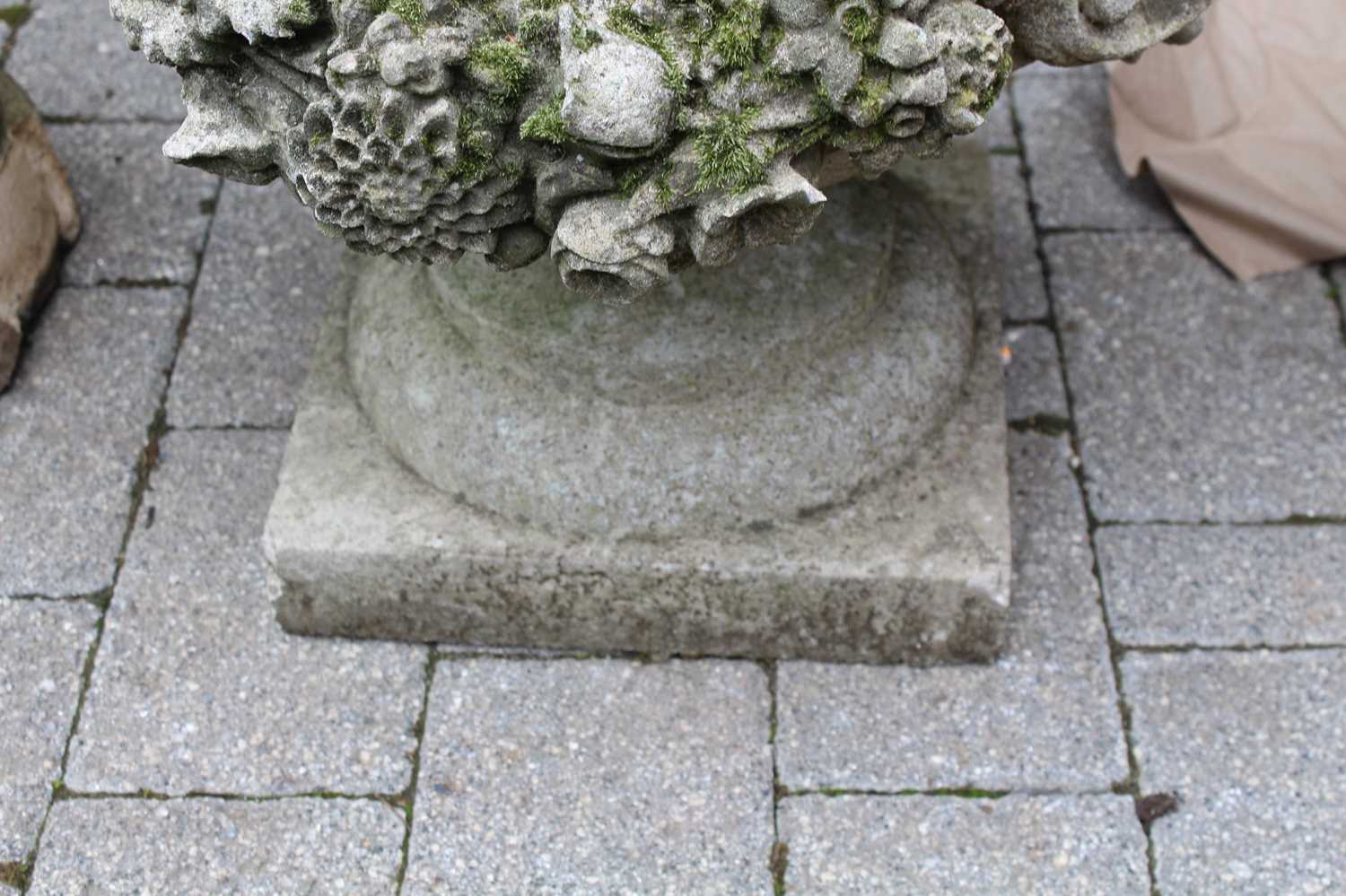 A reconstituted stone twin handled footed garden planter, decorated with heavy floral motifs, height - Image 3 of 3