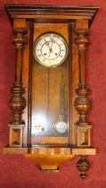 Early 20th century Vienna walnut cased drop trunk wall clock, 68cm