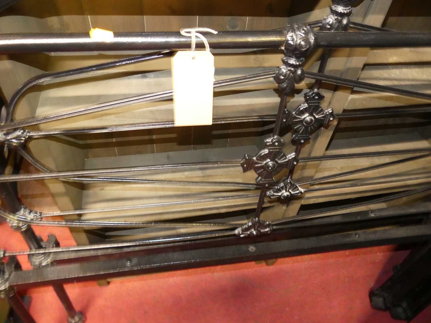 A late Victorian black painted wrought iron three-quarter size bedstead, with iron side rails - Image 2 of 2