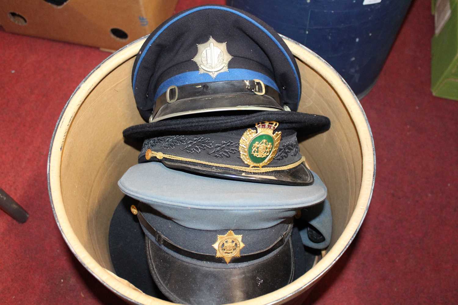 Two hat boxes of various military headwear, to include visor caps, female officers police examples - Image 2 of 2