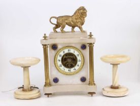 A circa 1900 alabaster and gilt metal three-piece clock garniture, surmounted with a lion, clock h.