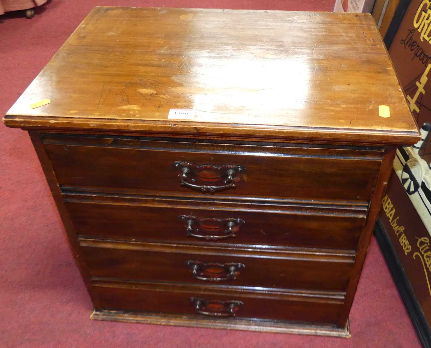 An Edwardian walnut four drawer music chest, the drawers with fall fronts w.50cm