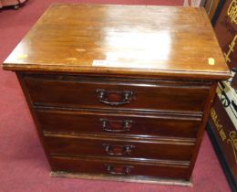 An Edwardian walnut four drawer music chest, the drawers with fall fronts w.50cm
