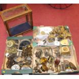 Three boxes of assorted clock parts, to include gilt metal figures, assorted cylindrical dials,
