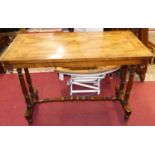 A Victorian mahogany and satinwood inlaid round cornered hall table, raised on turned supports,