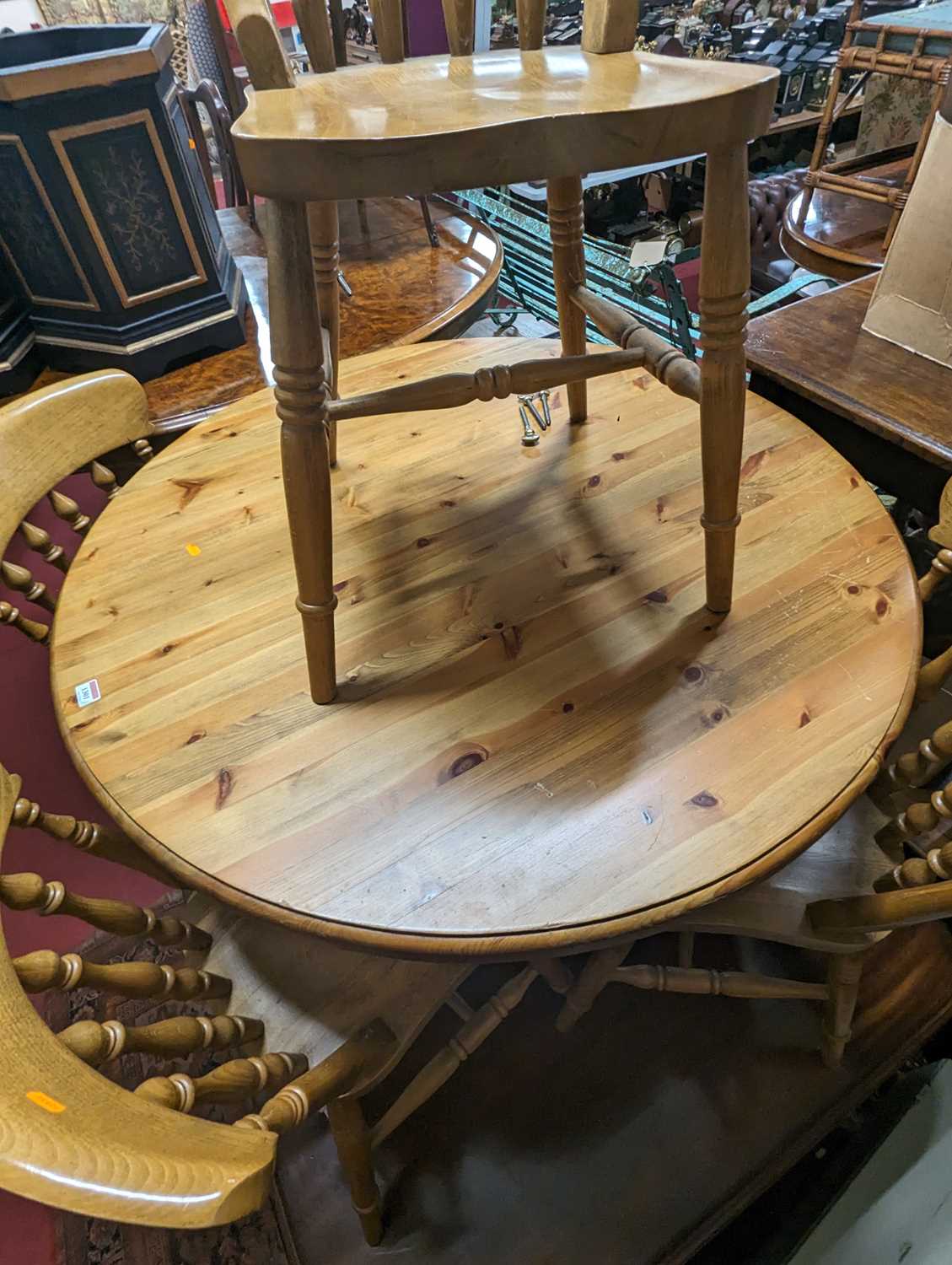 A modern pine circular breakfast table, dia.108cm; together with a set of four modern beech - Image 2 of 2