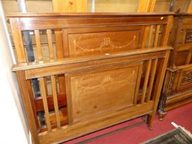 An Edwardian mahogany and floral satinwood inlaid and further chequer strung double bedstead, the