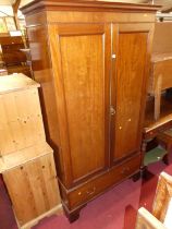 An early 20th century mahogany double door wardrobe, having single long lower drawer, w.110cm