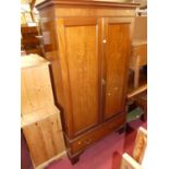 An early 20th century mahogany double door wardrobe, having single long lower drawer, w.110cm