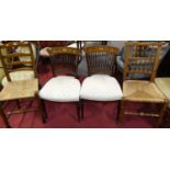 A pair of circa 1900 mahogany and floral satinwood inlaid bar and slatback dining chairs; together