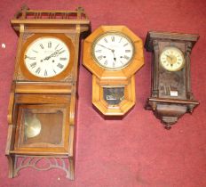 An Ansonia soft wood cased drop trunk wall clock, 47cm, together with two others (3)