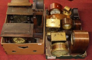 Two boxes of assorted mantel clocks and clock cases to include various wooden and brass examples (