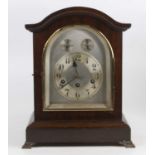 An early 20th century mahogany cased musical bracket clock having three train striking and chiming