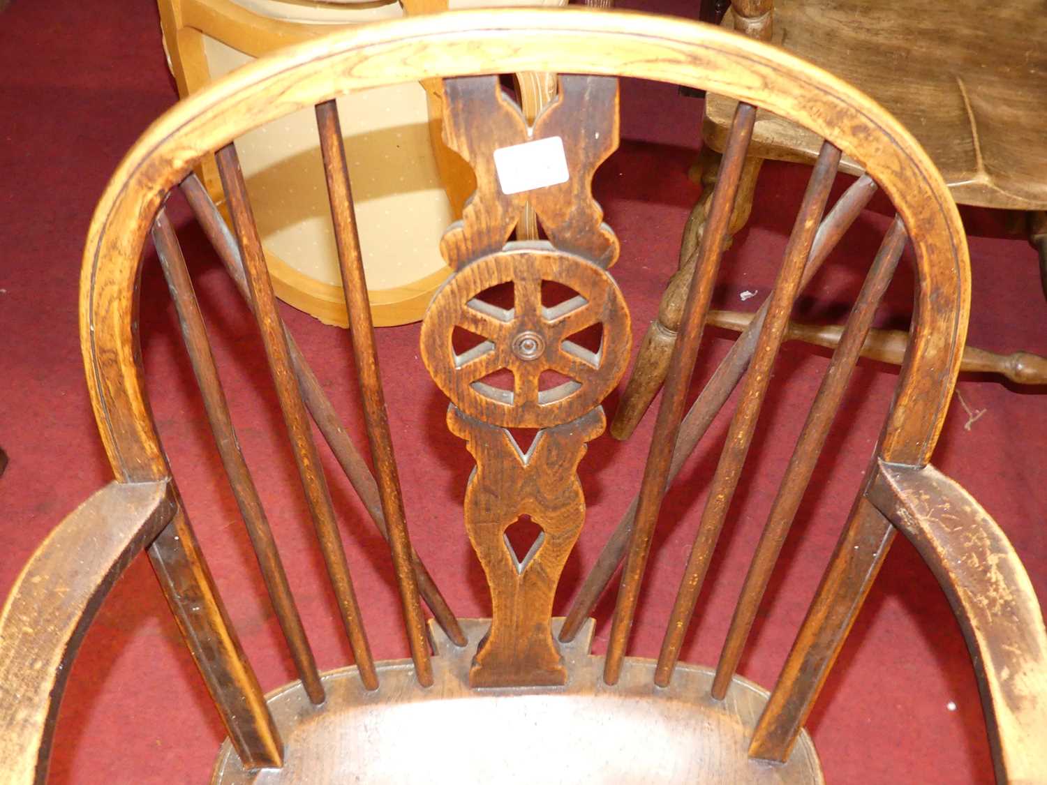 A 19th century elm, beech and fruitwood wheelback single elbow chair, on turned supports, w.52cm - Image 2 of 3