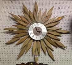 Seth Thomas - a sunburst wall clock, having quartz movement, dia.80cm