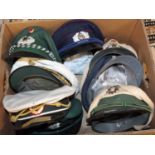 Three boxes of miscellaneous mainly police uniforms and caps, to include Austria Trasport Police cap