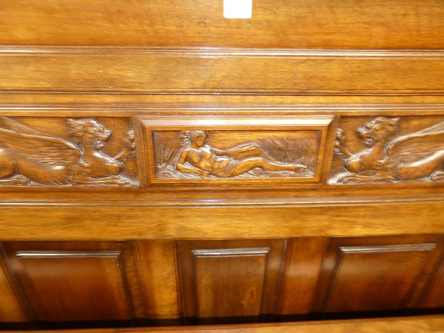 An early 20th century French relief carved walnut king size bedstead, the headboard with - Image 3 of 3