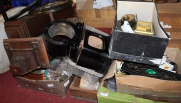 Three boxes of assorted clock parts, cases, three oval marble plinths etc