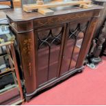 An Edwardian mahogany and floral satinwood inlaid double door glazed book case with interior