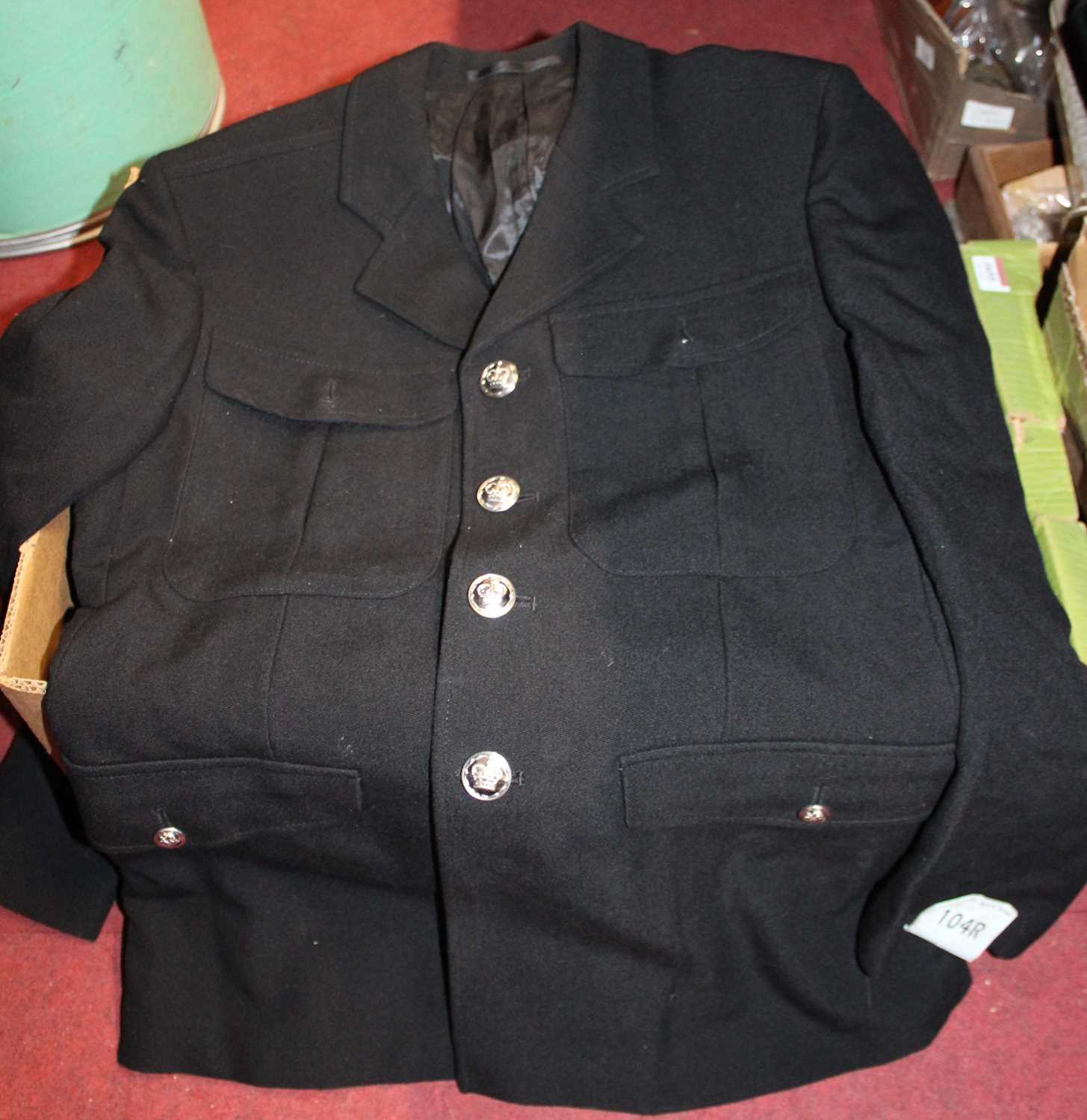 Two boxes of assorted military tunics and uniforms