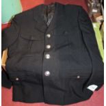 Two boxes of assorted military tunics and uniforms