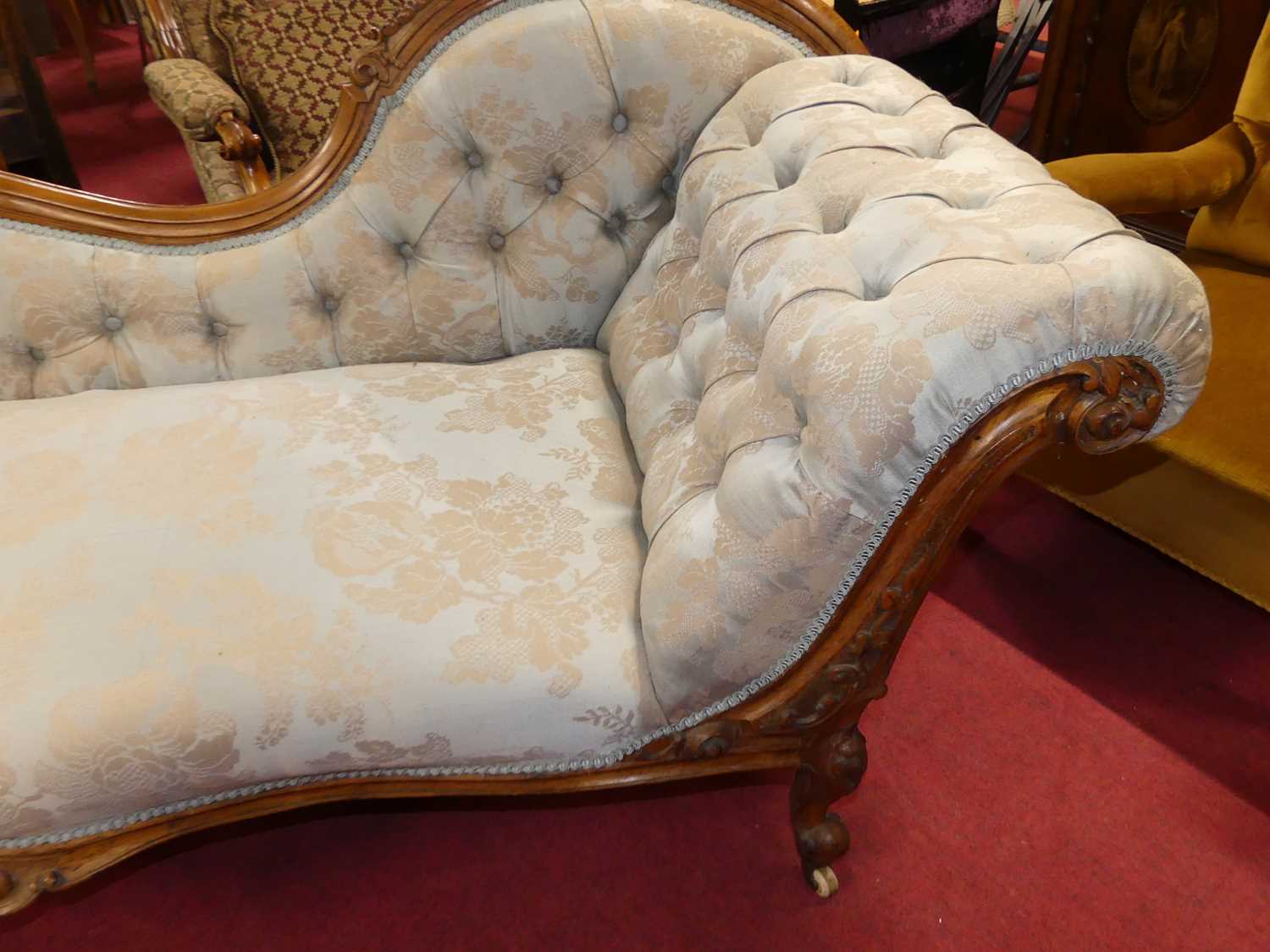 A mid-Victorian figured walnut framed and blue floral buttoned damask upholstered chaise-longue, - Image 2 of 5