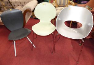 A perspex 'bucket' chair; together with a Galvano Tecnica single chair; and a set of three