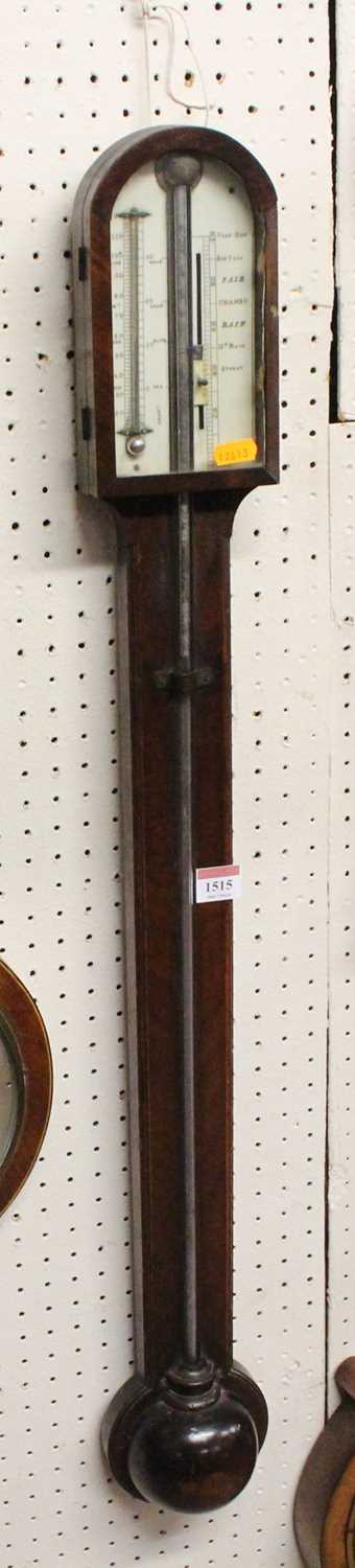 An early 19th century mahogany and inlaid stick barometer, having unsigned ivory scale and with