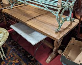 An elm rectangular trestle end refectory dining table, length 175cm 175 x 80cm; would seat 4