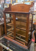 An Edwardian mahogany and chequer inlaid double door glazed wall mounted display cabinet with