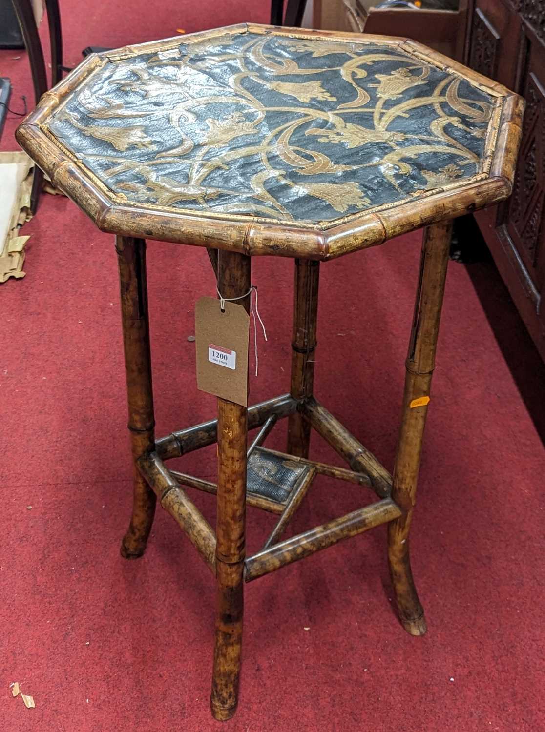 An early 20th century Japanese bamboo octagonal topped occasional table, width 50.5cm Very wobbly,