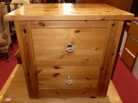 A modern pine two drawer bedside chest, w.62cm
