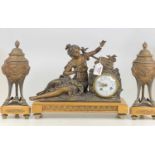 An early 20th century bronzed spelter and marble three-piece clock garniture, the clock as a