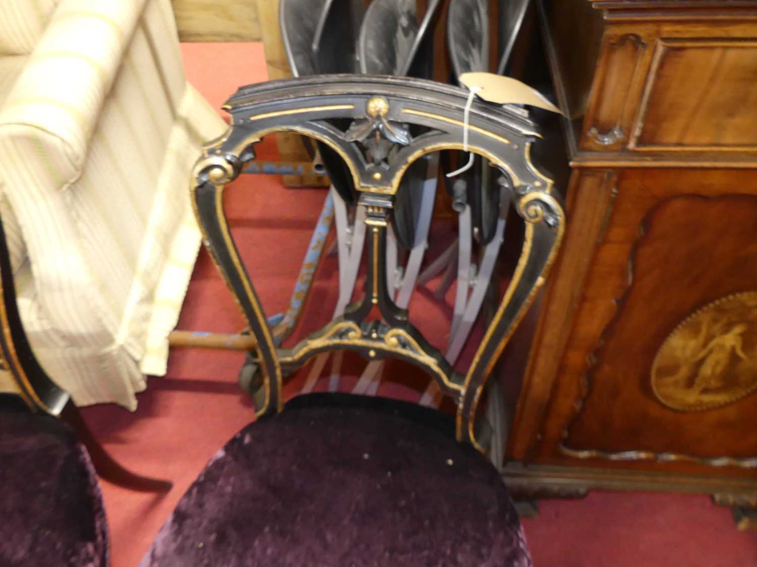 A set of four mid-Victorian ebonised and gilt decorated salon side chairs, having plush purple - Image 3 of 4