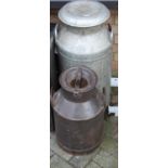 A galvanised twin handled milk churn and cover, together with one other similar (2) In used