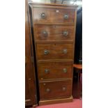 A mahogany narrow chest of five long graduated drawers with ringed brass handles, width 62cm