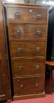 A mahogany narrow chest of five long graduated drawers with ringed brass handles, width 62cm