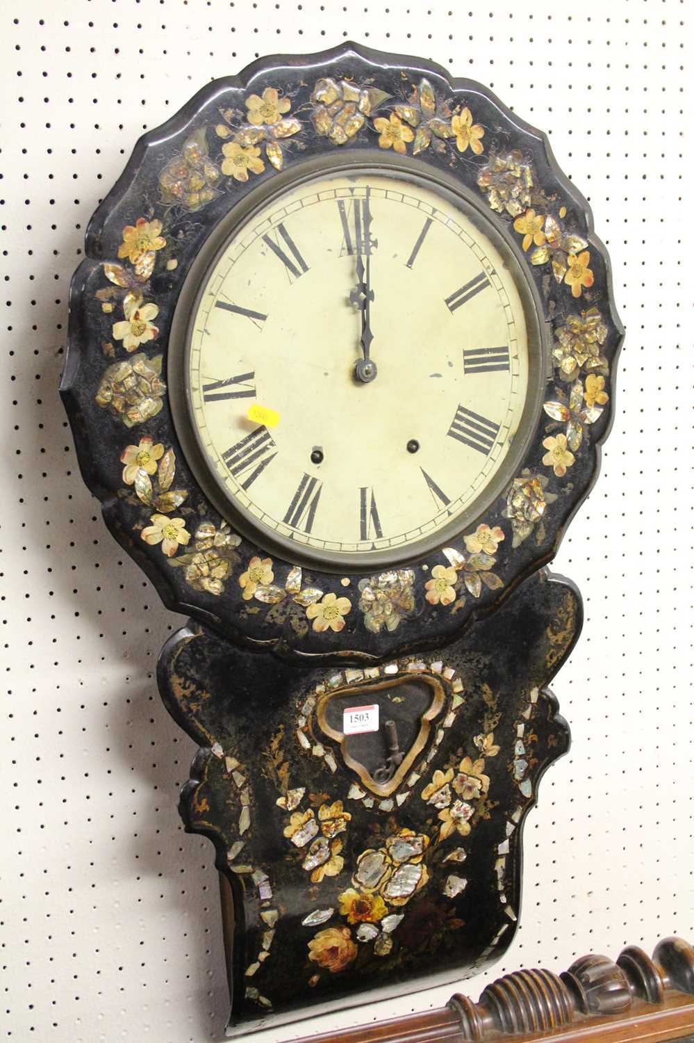 A Victorian papier-mache and mother of pearl inlaid droptrunk wall clock, having spring-driven