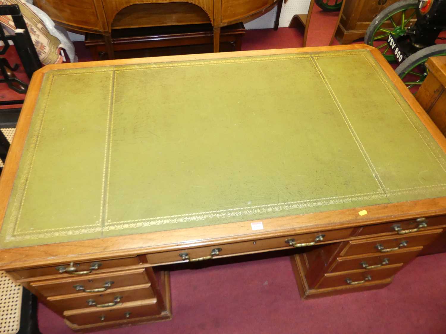 An early 20th century walnut and gilt-tooled green leather inset twin pedestal writing desk, - Image 2 of 3