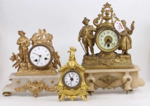A late 19th century gilt metal and alabaster mantel clock, height 35cm, together with one other gilt