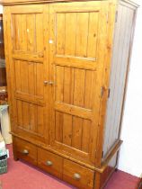 A contemporary stained and reclaimed pine double door wardrobe, with single long lower drawer, width
