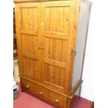 A contemporary stained and reclaimed pine double door wardrobe, with single long lower drawer, width